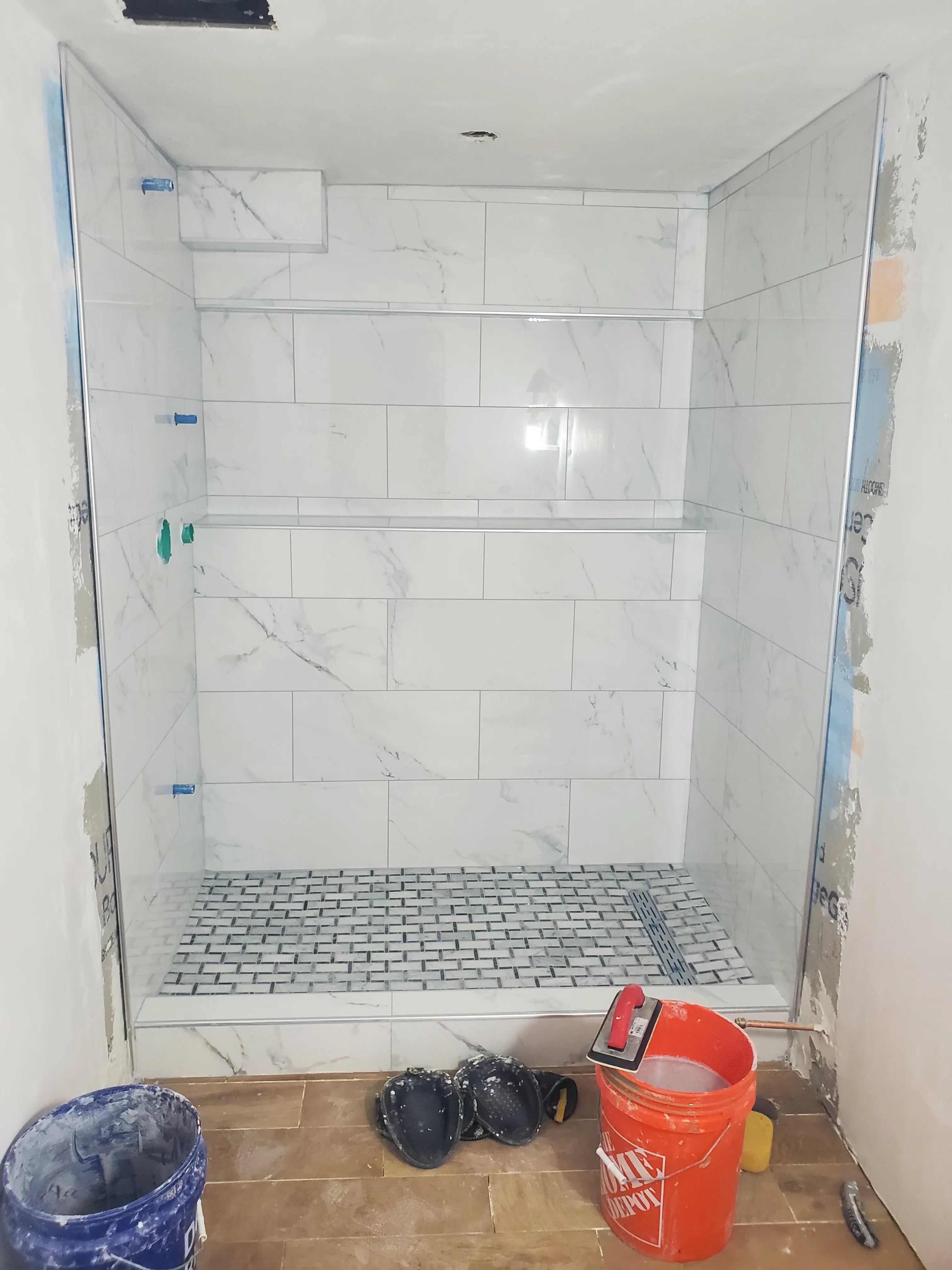 White Marble and Mosaic Tile Shower