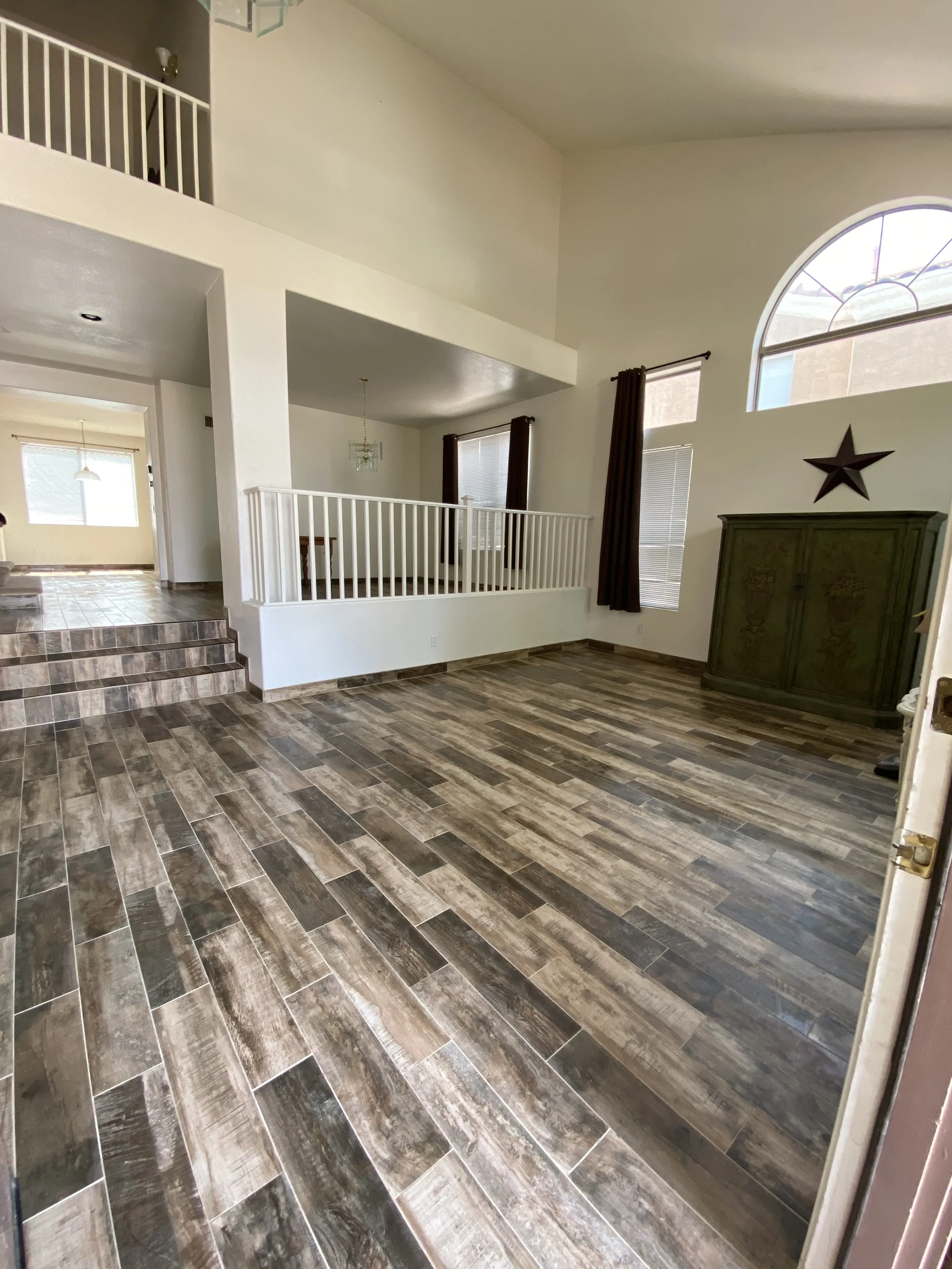 Large Format Wood-Look Porcelain Floor in Foyer
